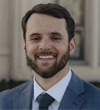 Smiling man in suit and tie